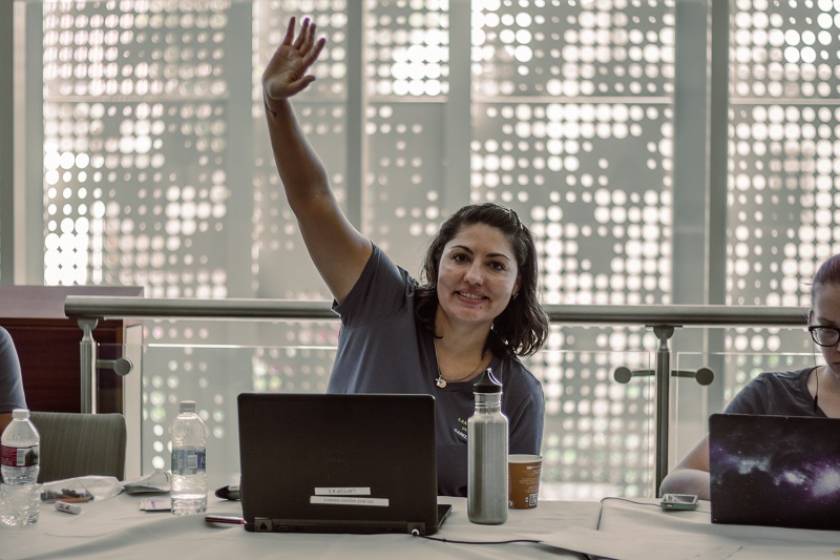 career center rep waving at career fair