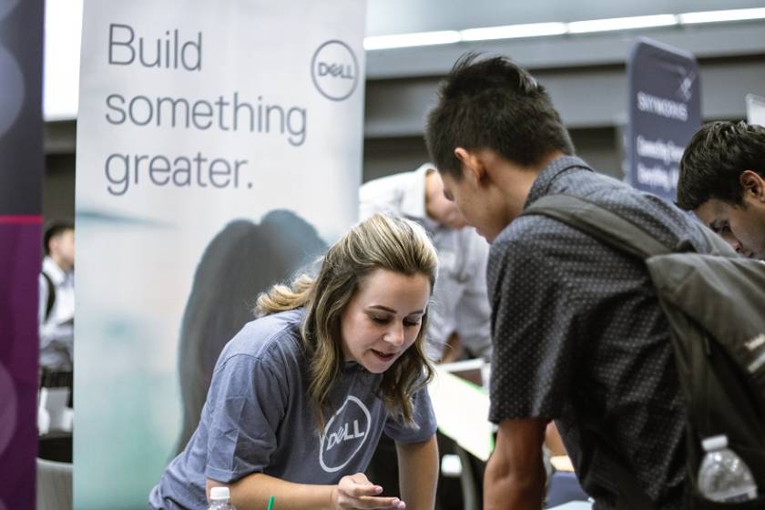 student meeting dell recruiter at career fair