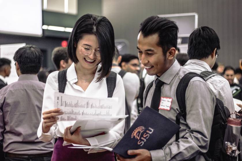two students attending career fair