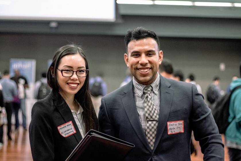 two students attending career fair