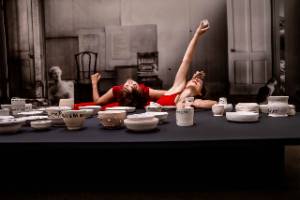 Revolution is a Dinner Party, photo of dancers at dinner table.
