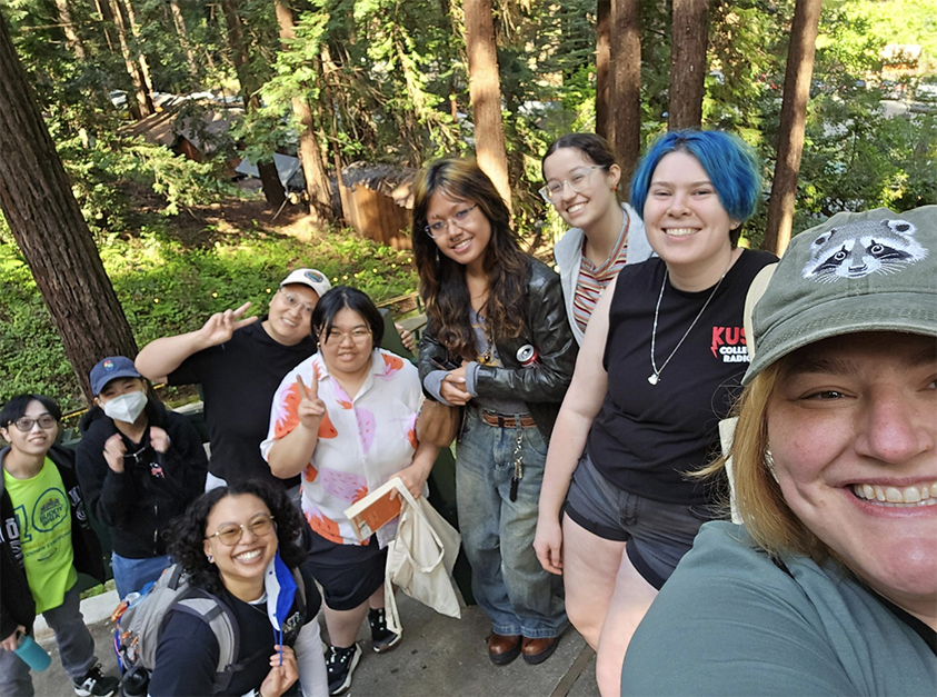 Group photo of oSTEM students at the Mystery Spot.